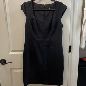 Never worn Black sheath dress with beautiful stitching and dainty capped sleeve